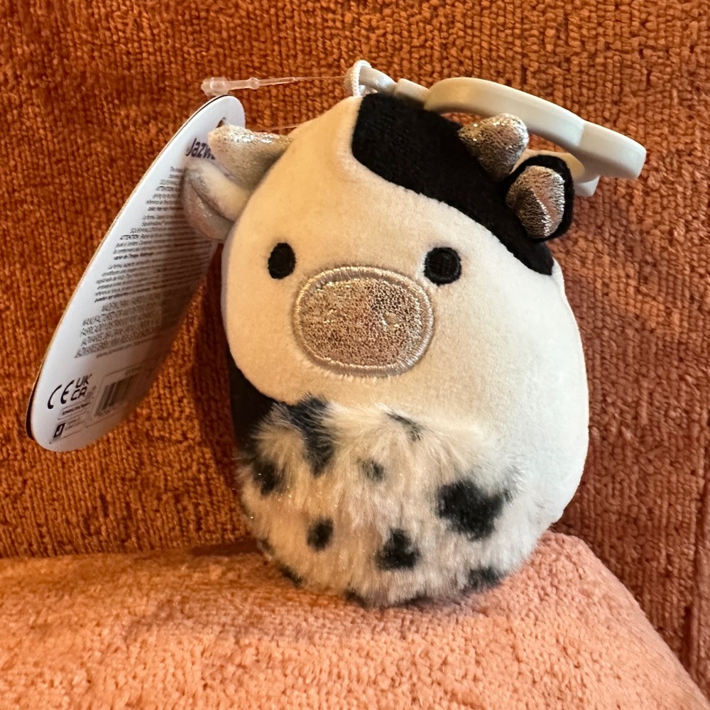 Squishmallows 3.5 in Ulga the Cow clip keychain with Select Series tag